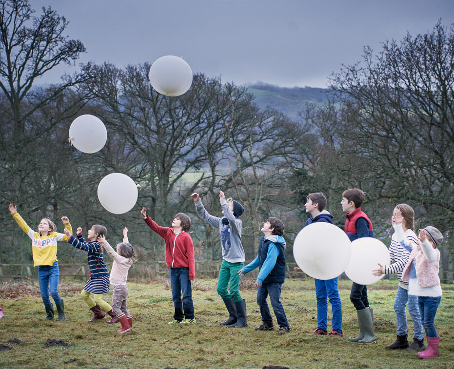 Giant balloons with children