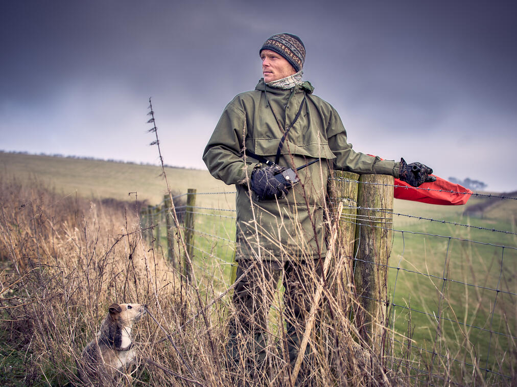 Beater on a pheasant shoot