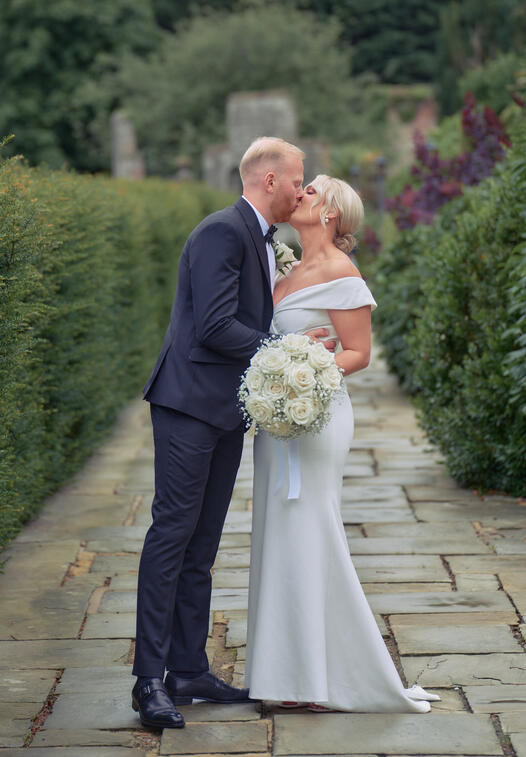 Bride and Groom kiss