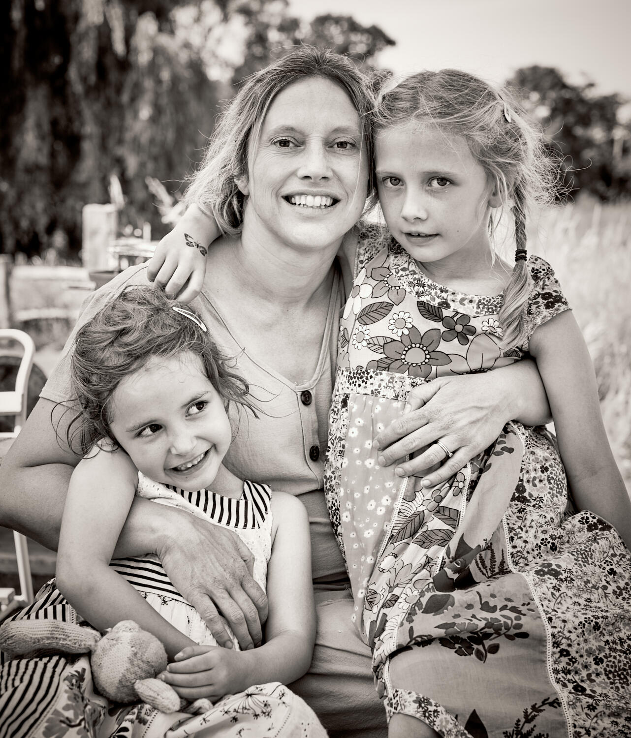 Mother and two girls in the countryside
